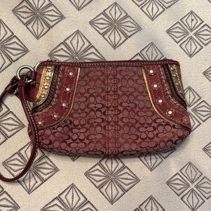 Coach Burgundy Wristlet with Gold Accents
